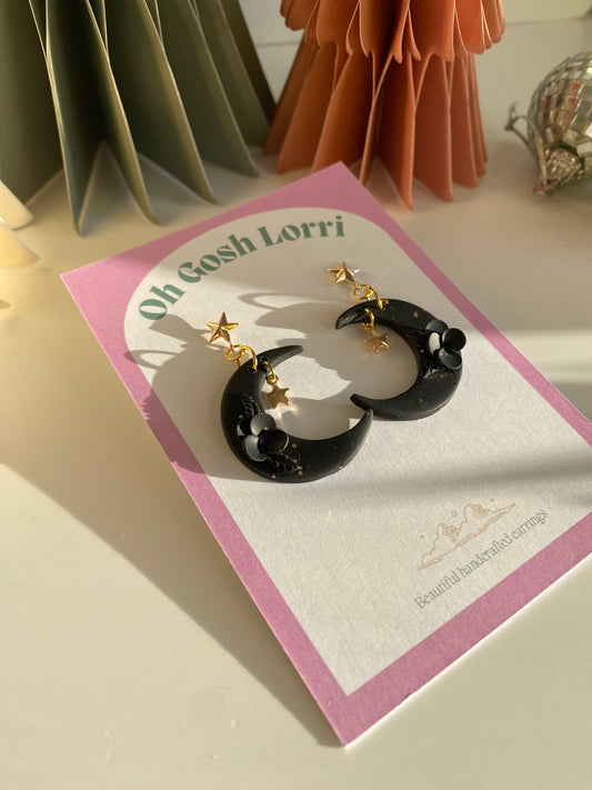 Black floral crescent moon earrings