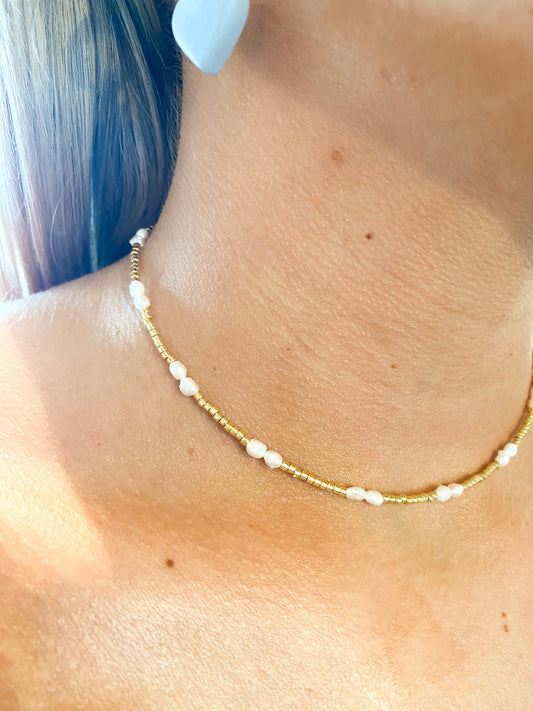 Gold beaded necklace with dainty pearls