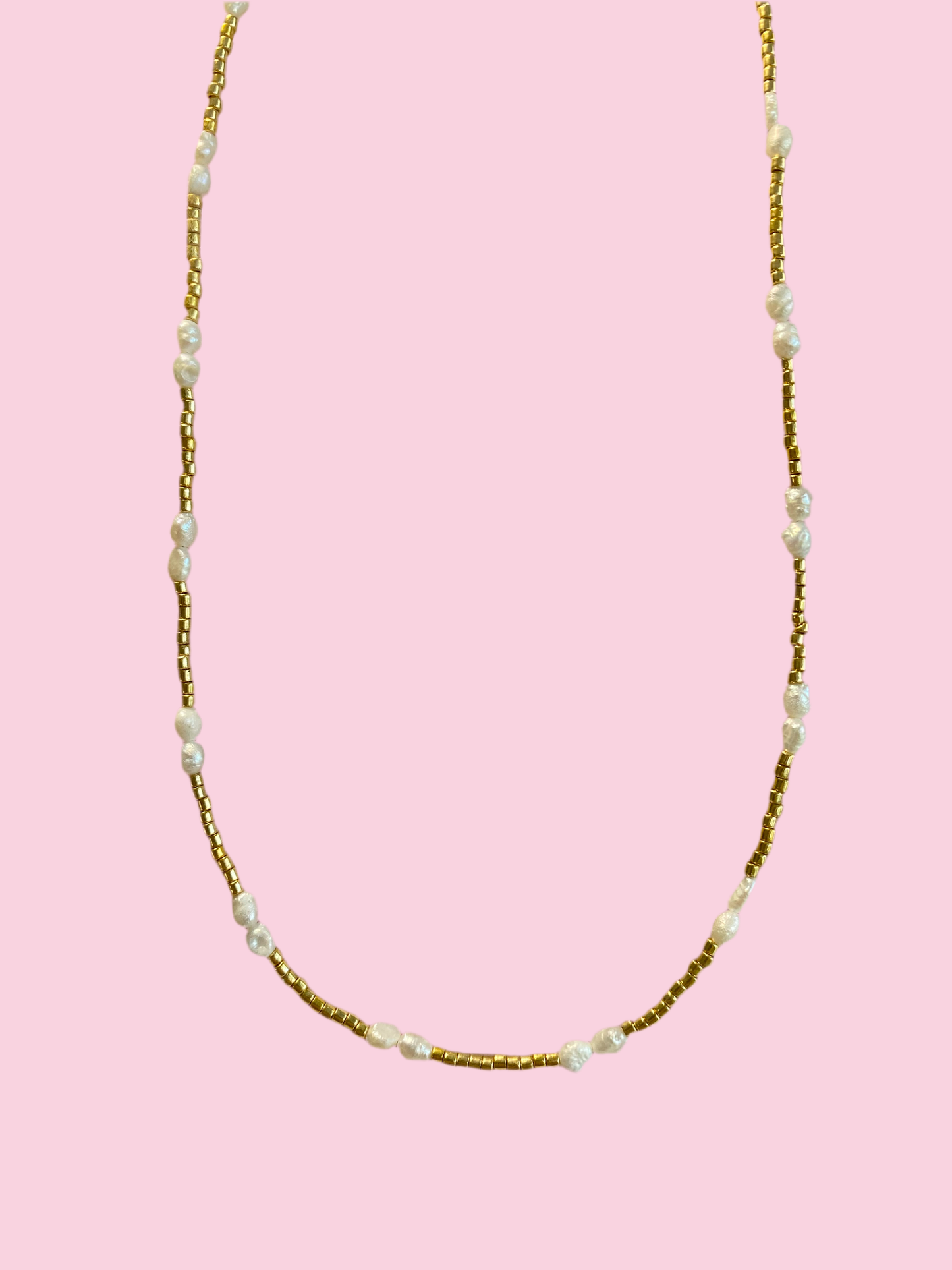 Gold beaded necklace with dainty pearls